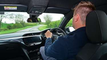 Auto Express senior news reporter Alastair Crooks driving the Vauxhall Corsa GS